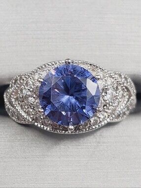 Round Tanzanite Center Stone & Pavé Accents - 925 Sterling Silver Twist Ring